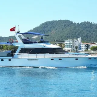 Enjoy a private yacht rental in Kemer with Antalya hotel transfers. Swim in clear waters, explore hidden bays, and enjoy lunch onboard. Book your trip today!