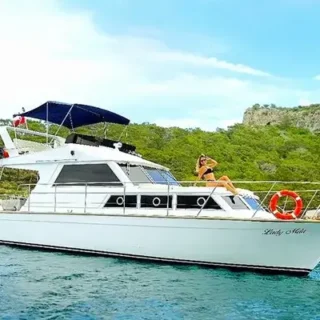 Enjoy a private yacht rental in Kemer with hotel transfers from Antalya. Discover hidden bays, swim in crystal-clear waters, and savor a delicious lunch onboard. Book now!