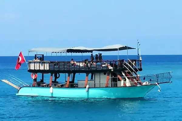 Book the Belek VIP Yacht Tour! Enjoy a quiet, small group trip with swimming, sunbeds, and grilled Sea Bass lunch. Ultimate relaxing excursion. Transfer included.