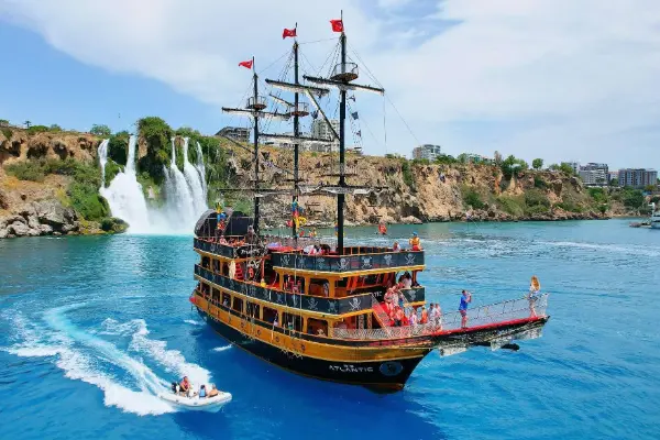 Book the Belek Pirate Boat Trip! Fun full-day excursion with foam party, music, and swimming in Turtle Bay. See waterfalls & coast. Transfer included!